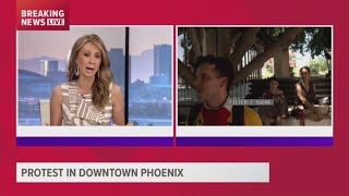 Protesters rally to 'defund police' near Phoenix City Hall