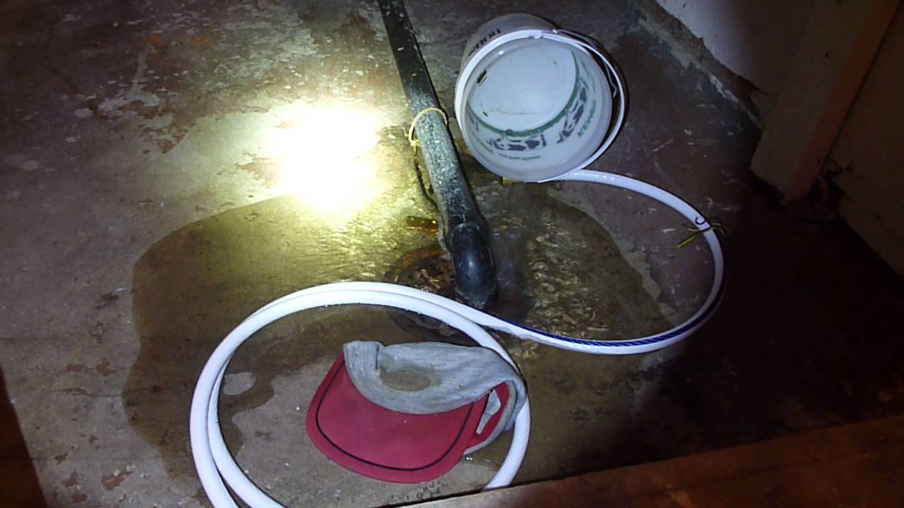 Laundry sink draining to a floor drain from across the basement. - YouTube