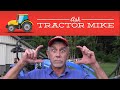 White tractors front axle comes loose unbelievable true story