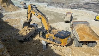 Caterpillar 390D Excavator Loading Caterpillar 775E Dumper And Trucks - Pyramis Ate