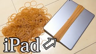 【衝撃映像】iPadに輪ゴム巻いていったら何本で壊れるのか？