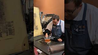 Printing a large photo engraving with orange ink for National Pumpkin Day (October 26)