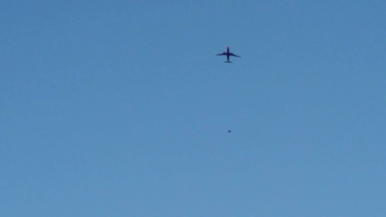9/11 Attack REVISITED on 9/25/15: Fighter jet escorting a plane - YouTube