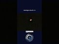 Bright orange orbs circling each other