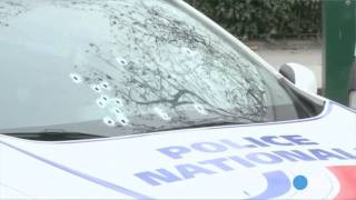 Paris officer killed amid hunt for massacre suspects