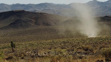 Dust Devil, Whirlwind, Desert Tornado nearly stationary as it churns harmlessly in the Mojave Desert