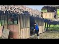 May and her mother built sturdy walls for their house using natural wood planks.