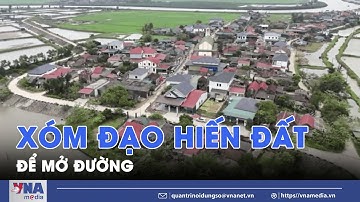 Xóm đạo hiến hàng nghìn mét đất để mở đường - VNA