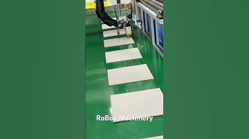 Automatic gluing machine with conveyor. RoBox machinery