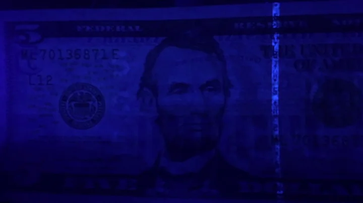 Detecting Counterfeit Money experiment (Black light Experiment)