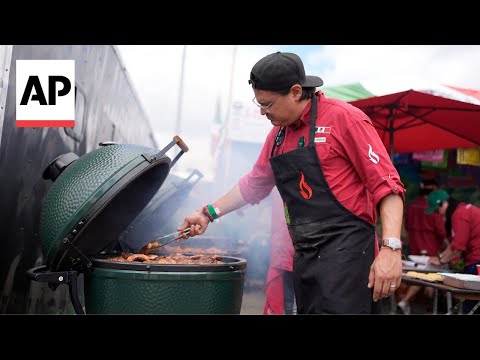 Pitmasters show off their skills as they compete in the World Championship Barbecue Cooking Contest