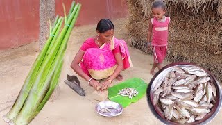 how santali tribe mother clean small fish and cooking with taro leaves for her baby||rural village