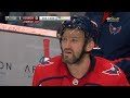 Unlucky fan gets a puck to the head