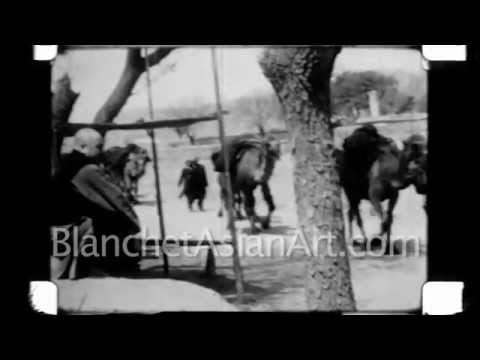 1920's Film of China: Tourist films a woman with bound feet and camel caravan