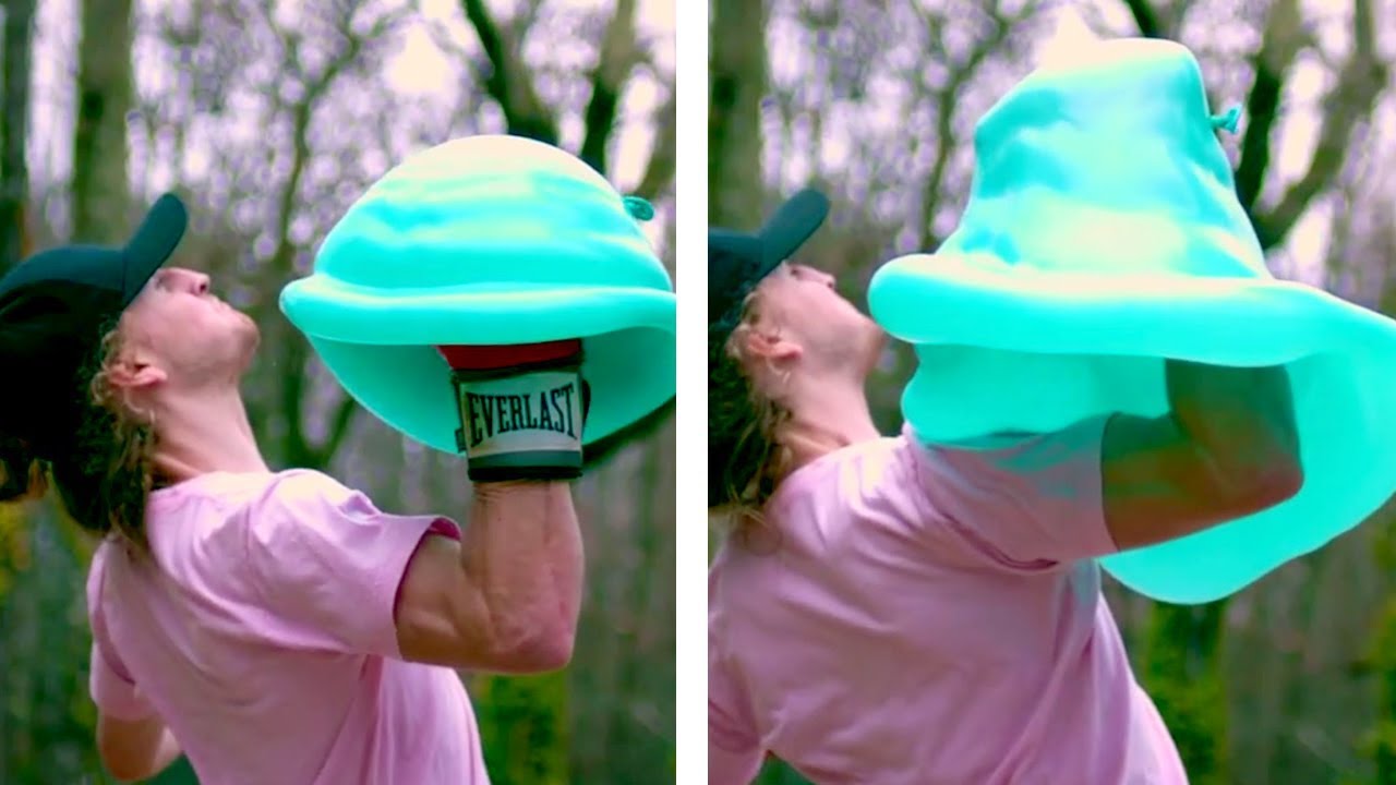Punching Water Balloon In Slow Mo YouTube
