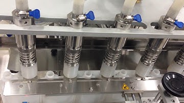 Automatic overflow filling machine for special container 自動六頭充填機