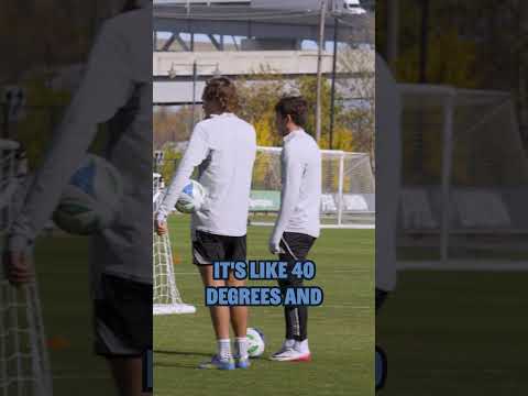 "He's wearing a beanie and a tank top"