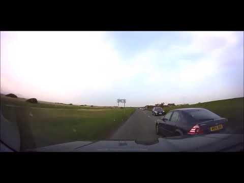 Car Inches from Three Way Collision