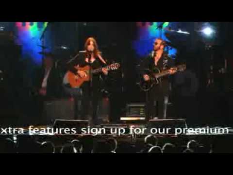Carla Bruni and Dave Stewart perform Blowing in th...