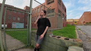 Smoking a cigarette, right here, right now