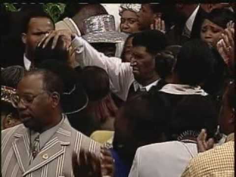 Pastor Simmons Praying Laying Hands 1 