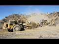 CATERPILLAR D10T2 and D10N shoving 651's