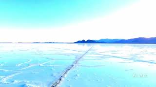 AI-Generated Sunrise Over Salar de Uyuni: Reflective Salt Flats & Majestic Mountains 🌄✨ screenshot 3