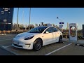 Tesla Supercharging a Tesla Model 3 2021 At The Leicester Fosse Park V3 Chargers