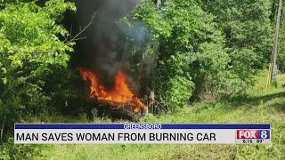 Man saves woman from burning car in Greensboro