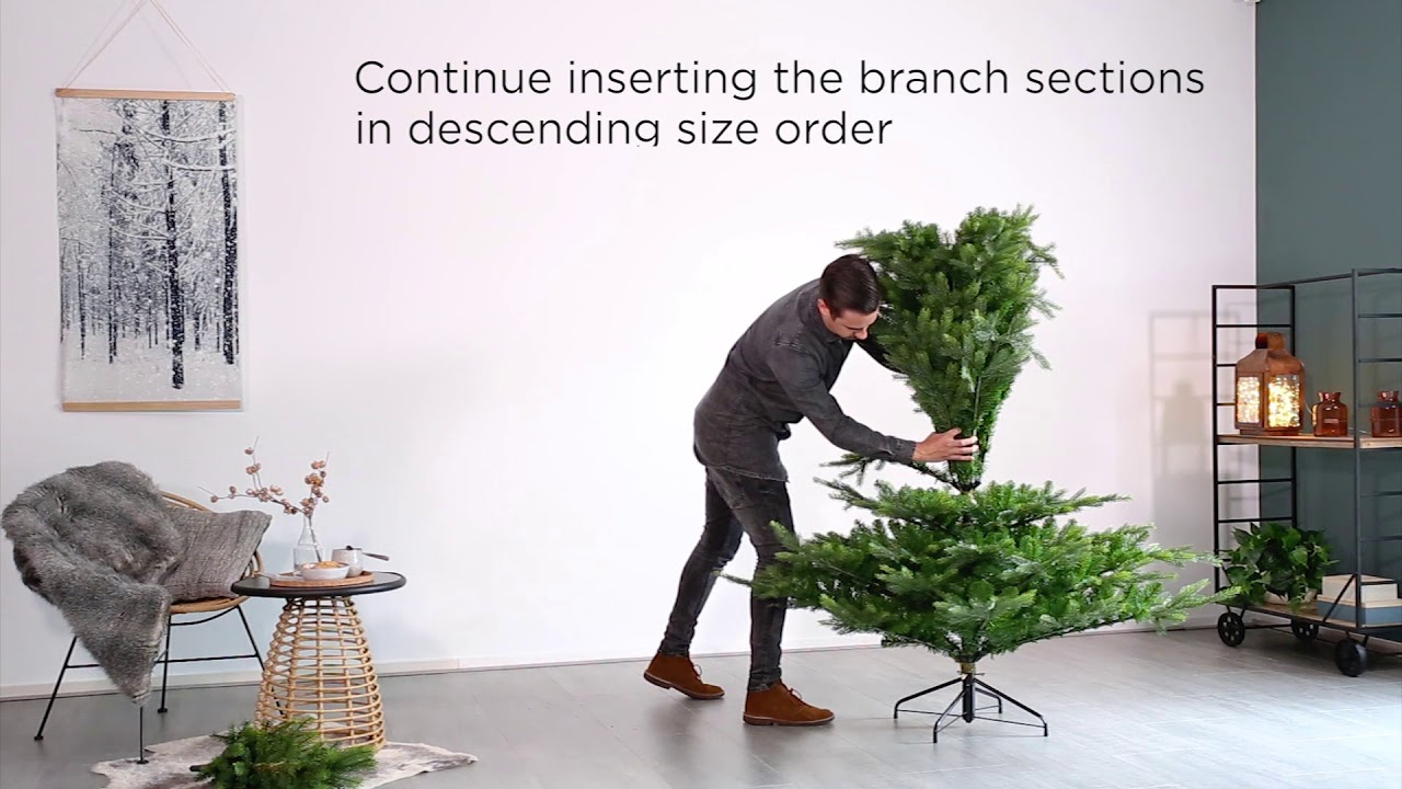 The Winter Calgary Fir Artificial Christmas Tree Assembly
