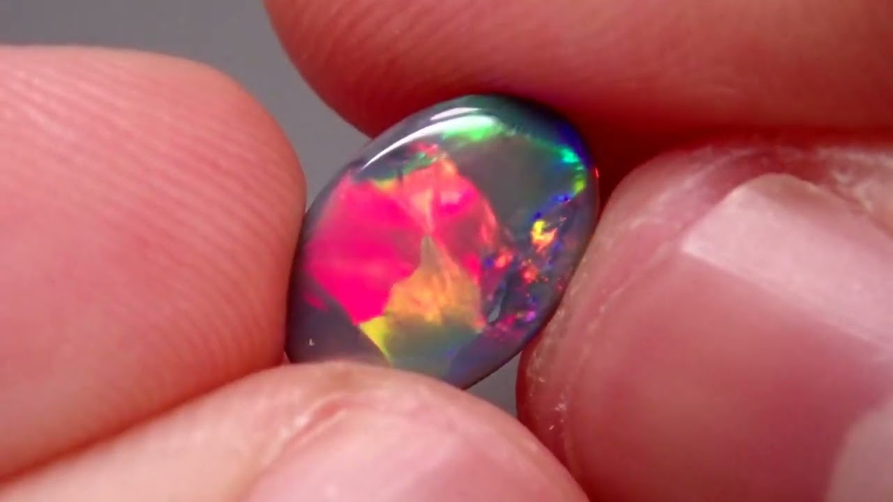 ハーレクイン】ブラックオパール 1.12ct - オパールルース・原石の専門