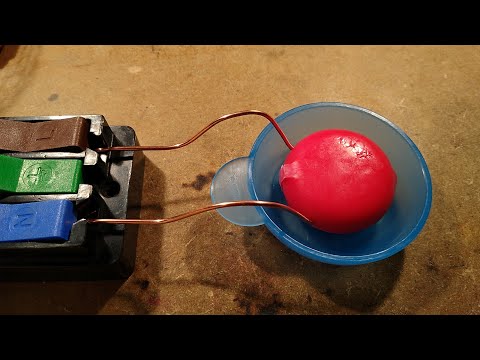 Zapping a Babybel cheese at 250V with its wax on. - Zapping a Babybel cheese at 250V with its wax on.