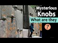 Mysterious knobs at ancient megalithic sites  molded  cast or quarried
