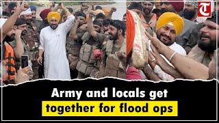 Jalandhar MP Charanjit Channi joins Army & villagers to strengthen weak Sutlej bundh at Phillaur
