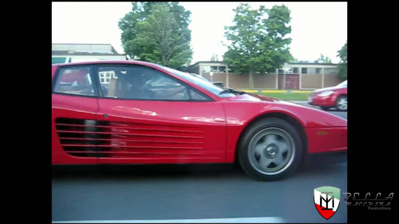 Ferrari Testarossa driving down Merivale
