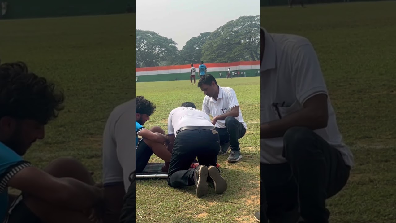 Football Khiladi ka treatment Karte huye# CLW stJohnAmbulance #￼ ￼ staff ￼# Indoor Stadium #  Crj.