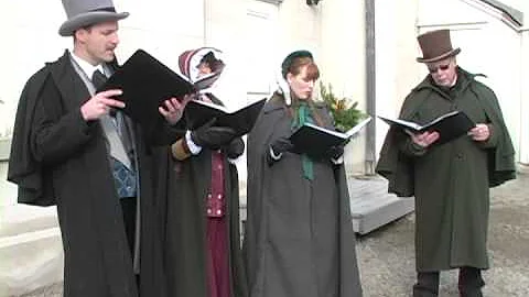 The Baker Street Victorian Carollers Singing at Du...