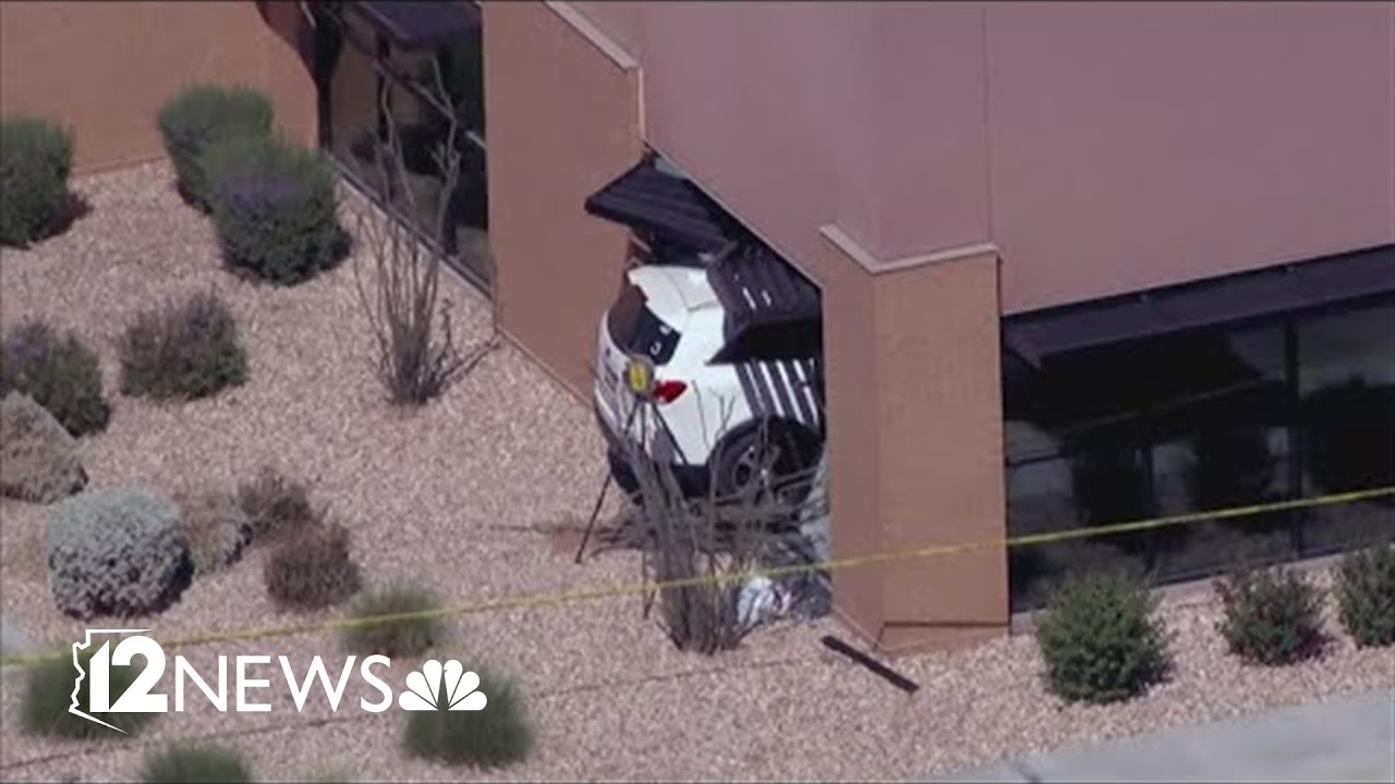 No one injured after car crashes into building - YouTube