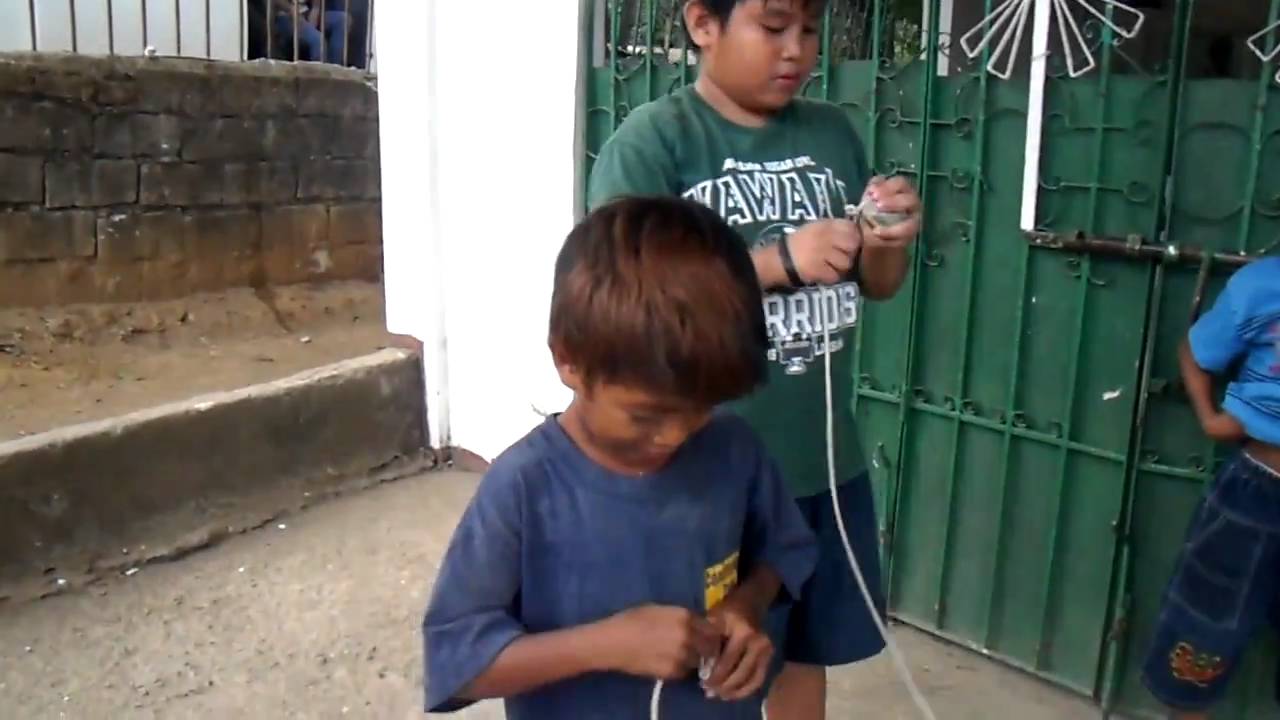 little filipino boys & spinning tops YouTube