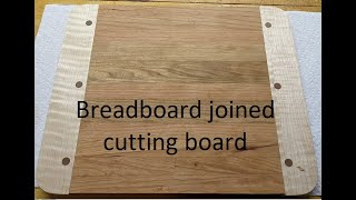 Multiwood, Breadboard Cutting Board  unique design and joinery using floating tenons.