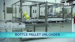 Automated Bottle Pallet Unloader with FANUC Pick & Place Robot – Clear Automation