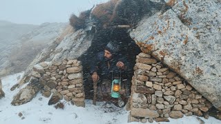 Caught in a blizzard and thick fog. A refuge in the mountains. Staying on a cold winter night.