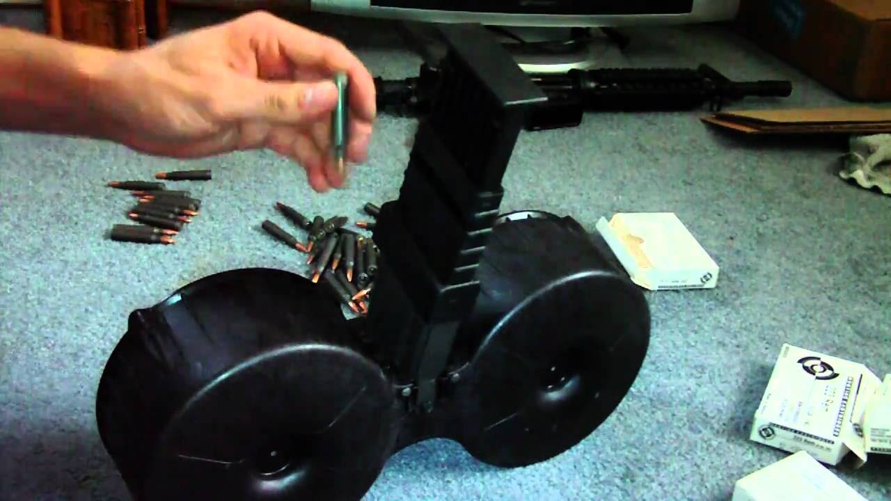 Loading the ARMATAC SAW-MAG (150 round AR-15 drum) - YouTube.