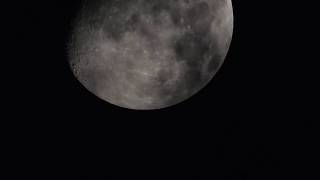 Clouds passing by and covering the moon 01