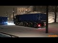 4k dump trucks tipping snow into a snow melting barge