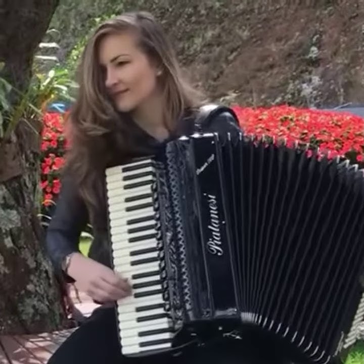 Amazing talented female acordian player