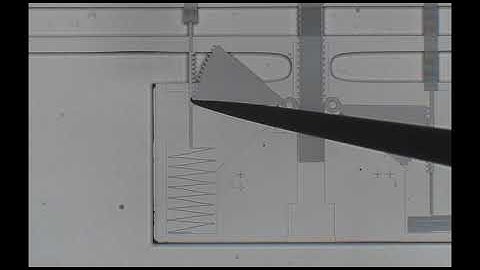Substrate Spring Deflected By An Electrostatic Inchworm Motor