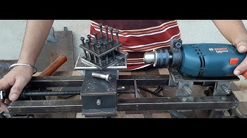 Homemade drill powered mini lathe machine. drill powered metal lathe machine.