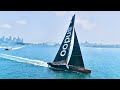 Foiling behind the fastest supermaxi in the world andoo comanche