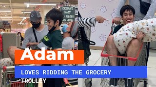 Autism Teen Adam Rides Grocery Trolley